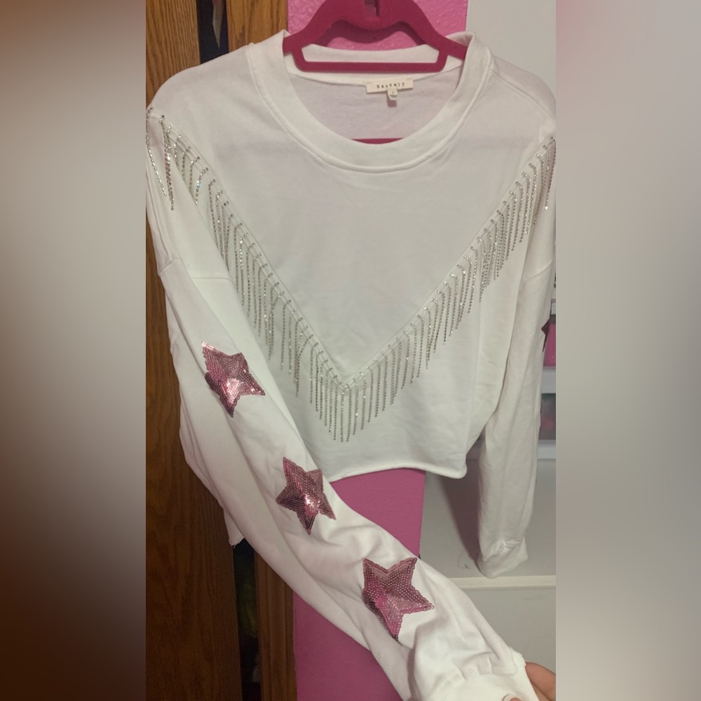 NWOT. Sold at Dry Goods. Brand is Baevely. Size Large Cropped.